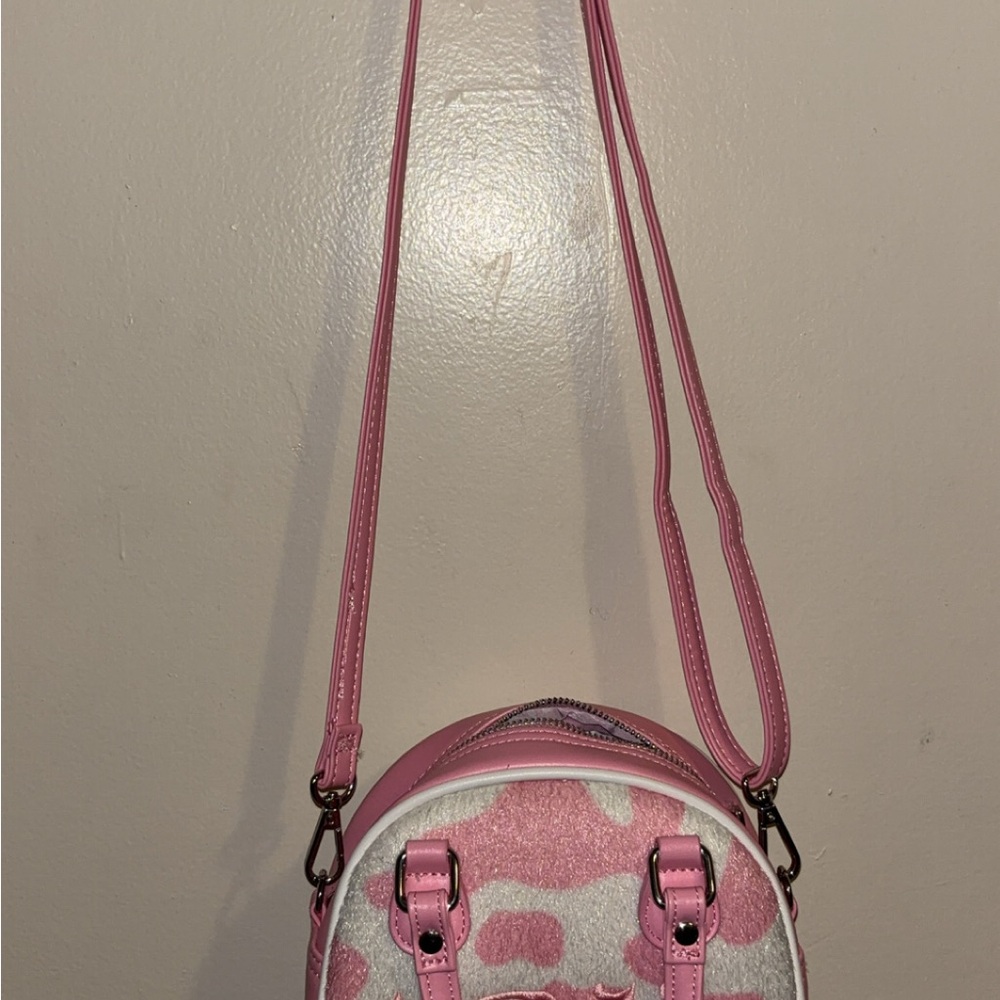 Von Dutch-pink cow print purse.